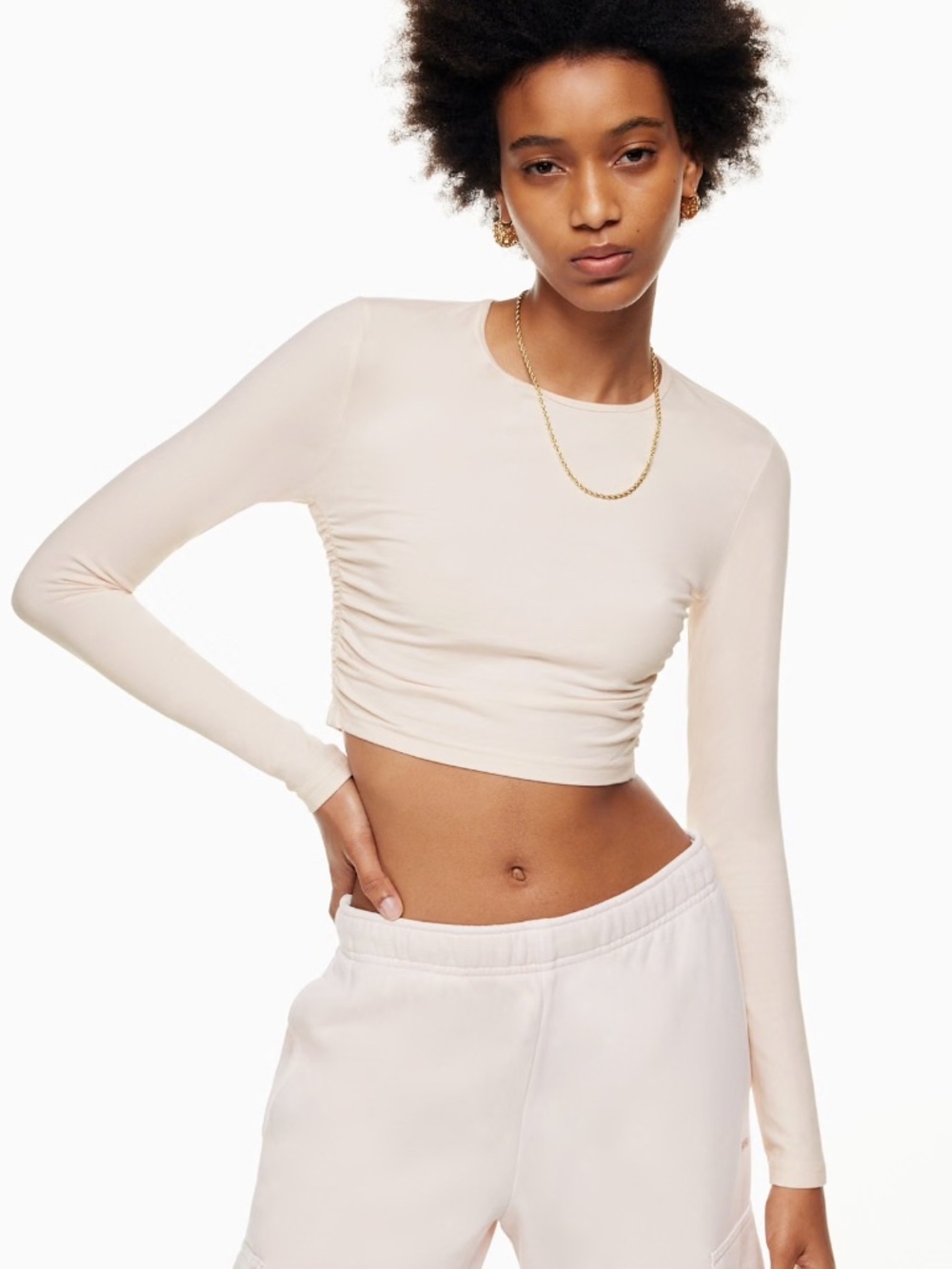 Aritzia TNA Light Pink Chill Malibu Cropped Longsleeve Top Size M 95% Cotton